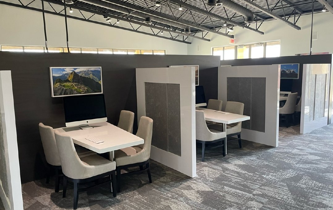Completed sales bays with tables, displays and divider panels
